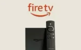 Fire TV Stick beside its remote